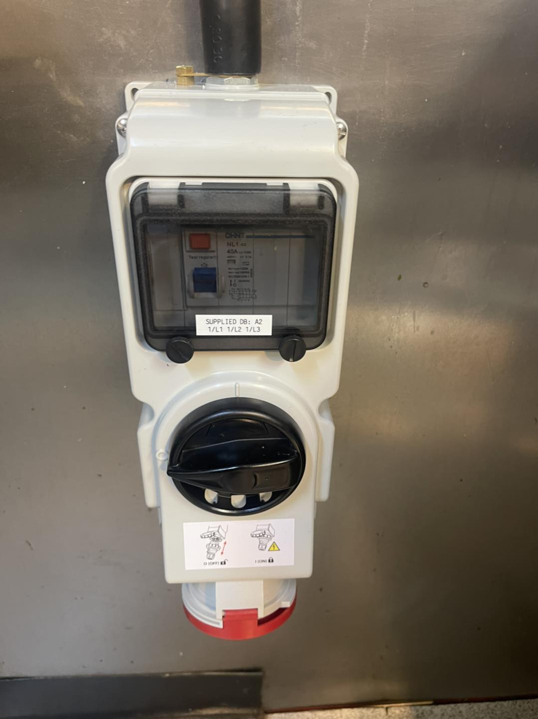 Three-phase switched interlocked industrial socket with rotary isolator, RCD protection and circuit labelling