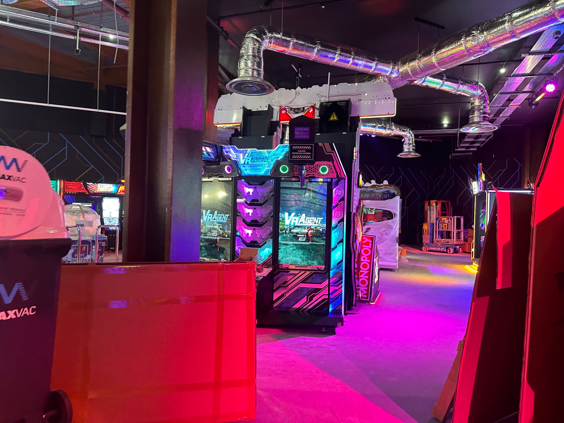 Ceiling ductwork and diffusers above virtual reality gaming cabinets